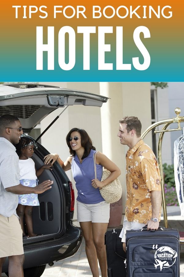 Tips for booking hotels with a bellboy helping a family put their luggage into a car